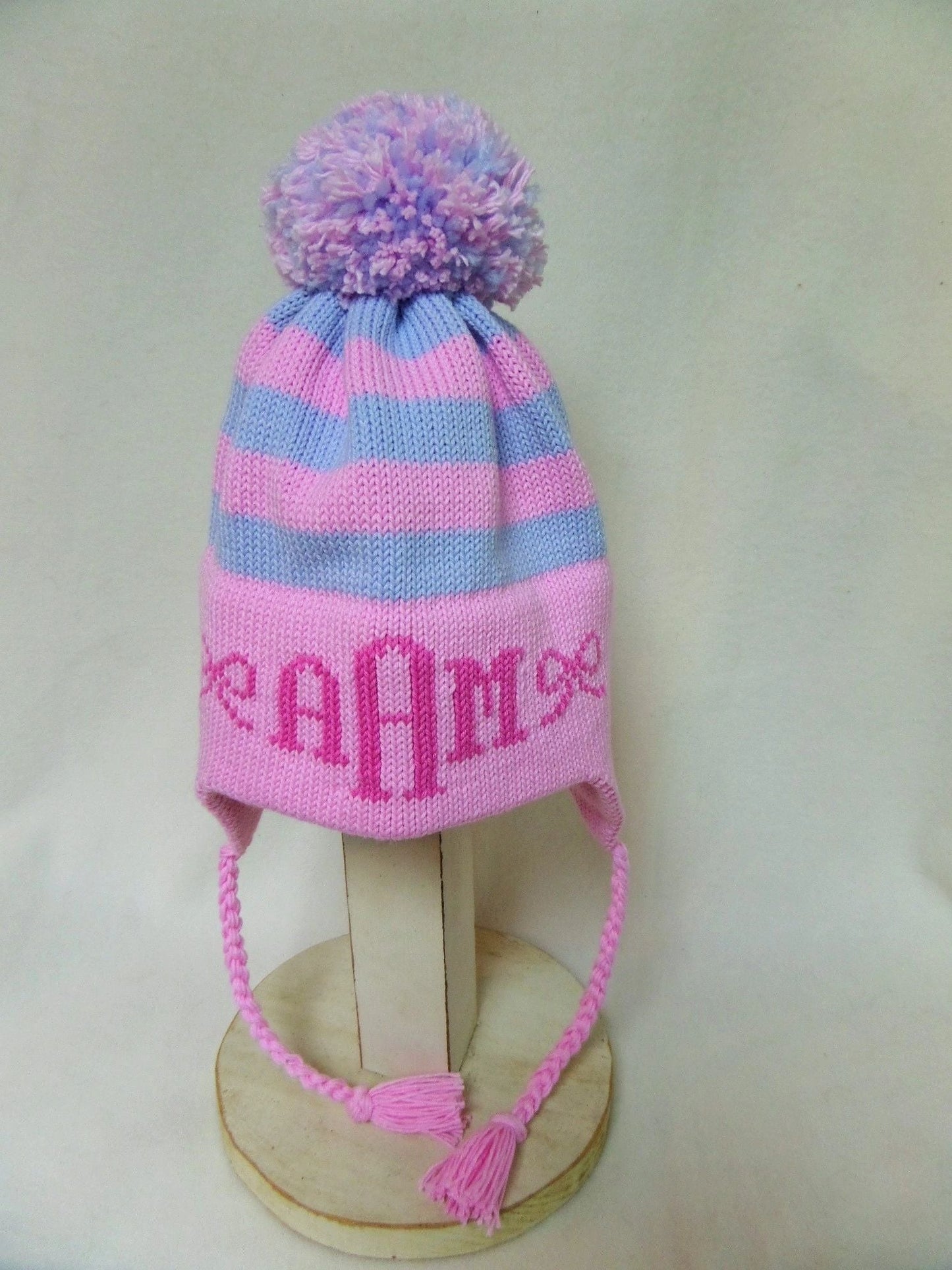 STRIPE EARFLAP WITH MONOGRAM BOWS AND POMPOM | Devonknitwear